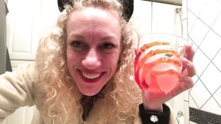 Showerbooze featuring lip sync of zombie and a orange cocktail - cheers this Halloween!