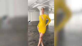 The beauty that is Priscilla Ricart, in a stunning yellow and blue dress.
