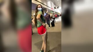 Flashing her buttplug at the airport - Public Fucking
