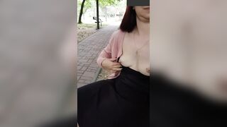 Flashing boobies and pussy on a bench in a park - Public Sexiness